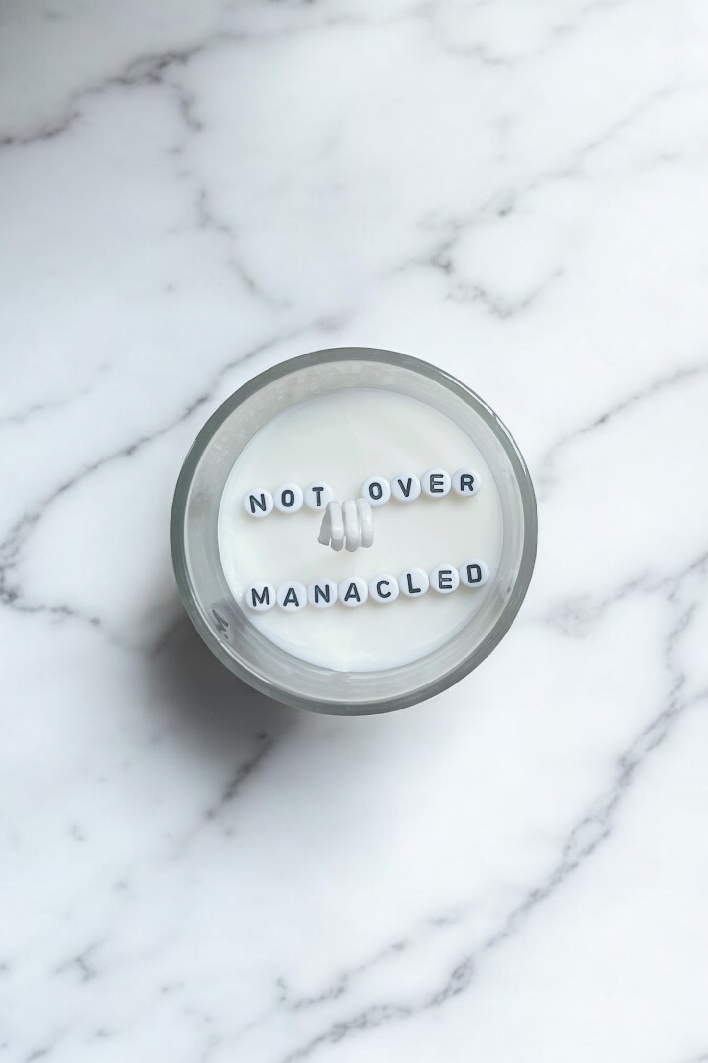 Not Over Manacled Candle